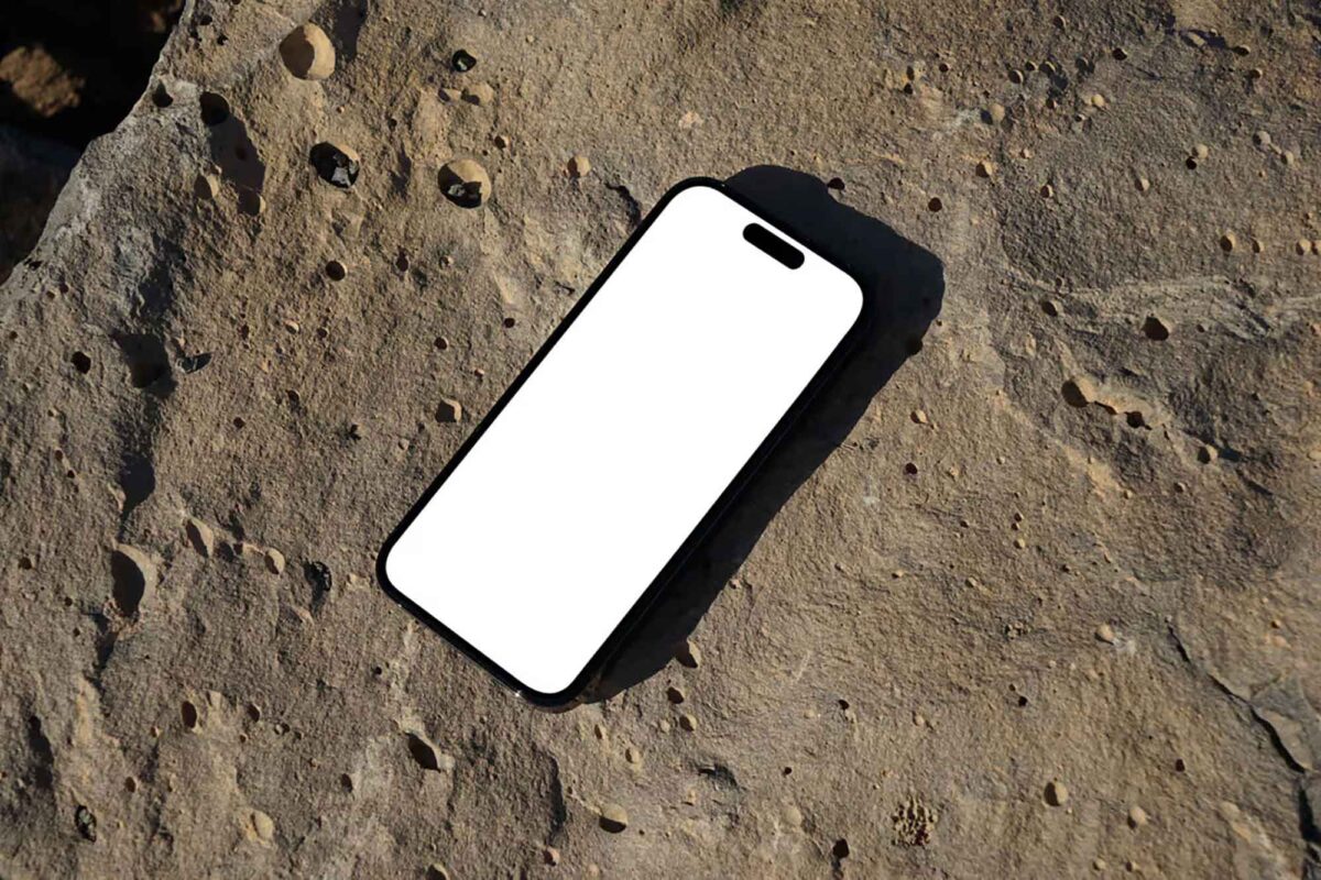 iPhone Pro on Rock Mockup PSD